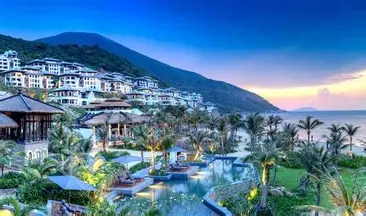 Cable car funicular descending through the lush InterContinental Danang resort